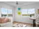 Living room with water views and comfortable seating at 9397 Midnight Pass Rd # 404, Sarasota, FL 34242