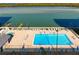 Resort-style pool and sundeck at 9397 Midnight Pass Rd # 404, Sarasota, FL 34242