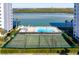 Community pool and tennis courts at 9397 Midnight Pass Rd # 404, Sarasota, FL 34242