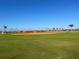 Baseball field with well-maintained field and lush grass, perfect for outdoor sports and recreation at 10109 Milky Way Cir, Sarasota, FL 34241