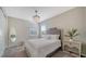 Comfortable bedroom with a decorative chandelier and neutral tones at 10109 Milky Way Cir, Sarasota, FL 34241