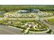 Aerial view of Skye Ranch community amenities including a playground, sports courts and community center at 10109 Milky Way Cir, Sarasota, FL 34241