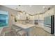 Beautiful kitchen with quartz countertops, a mosaic-tiled island, and stainless steel appliances at 10109 Milky Way Cir, Sarasota, FL 34241