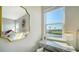 Main bedroom desk with window views, decorative lighting, and elegant design at 10109 Milky Way Cir, Sarasota, FL 34241