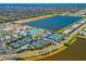 Aerial view of community with pool, tennis, pickleball courts at 10201 Beach Dune Dr, Englewood, FL 34223