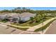 Single-Gathering home with tile roof and landscaped yard at 10201 Beach Dune Dr, Englewood, FL 34223