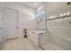 Modern bathroom with a large walk-in shower at 10201 Beach Dune Dr, Englewood, FL 34223