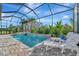 Enjoy this beautiful screened pool and spa at 10201 Beach Dune Dr, Englewood, FL 34223