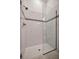 Large walk-in shower with glass enclosure at 10201 Beach Dune Dr, Englewood, FL 34223