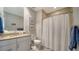 Clean bathroom with shower, toilet, and vanity at 10510 Boardwalk Loop # 404, Lakewood Ranch, FL 34202