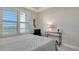 Bright bedroom with water views and comfortable bed at 10510 Boardwalk Loop # 404, Lakewood Ranch, FL 34202