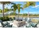 Enjoy the outdoor fire pit with lake views at 10510 Boardwalk Loop # 404, Bradenton, FL 34202