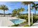 Enjoy this hot tub with a view of palm trees and lake at 10510 Boardwalk Loop # 404, Bradenton, FL 34202