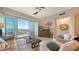 Bright living room with water views, comfy seating, and a coffee table at 10510 Boardwalk Loop # 404, Bradenton, FL 34202