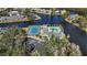 Community tennis court and pool, from an aerial perspective at 11124 Sanctuary Dr, Bradenton, FL 34209