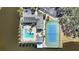 Community pool and tennis courts are shown in this overhead view at 11124 Sanctuary Dr, Bradenton, FL 34209