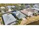 Aerial view of houses and a canal at 11124 Sanctuary Dr, Bradenton, FL 34209