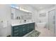 Elegant bathroom with double vanity and freestanding tub at 11124 Sanctuary Dr, Bradenton, FL 34209