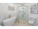 Spa-like bathroom featuring a free-standing tub and glass shower at 11124 Sanctuary Dr, Bradenton, FL 34209