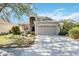 Two-story house with attached garage and landscaped lawn at 11124 Sanctuary Dr, Bradenton, FL 34209