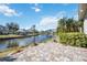 Charming patio with pavers and water view at 11124 Sanctuary Dr, Bradenton, FL 34209