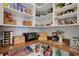 Organized pantry with ample shelving for storage at 12366 Marsh Pointe Rd, Sarasota, FL 34238