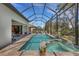 Screened pool and spa with spacious patio at 12366 Marsh Pointe Rd, Sarasota, FL 34238