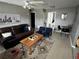 Living Room with a brown leather couch and coffee table at 1308 W Cypress St, Tampa, FL 33606