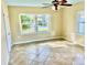 Bright bedroom with tile floors and large windows at 1414 6Th W St, Palmetto, FL 34221