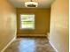 Bright dining area with tile floors and a built-in bench at 1414 6Th W St, Palmetto, FL 34221