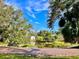 Wooden dock overlooking a serene pond at 1414 6Th W St, Palmetto, FL 34221