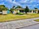 Front yard view of the house and garden at 1414 6Th W St, Palmetto, FL 34221