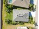 An aerial view of a house with a large backyard at 14822 Trinity Fall Way, Bradenton, FL 34212