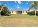 House with screened lanai and grassy backyard at 14822 Trinity Fall Way, Bradenton, FL 34212