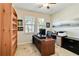 Home office features built-in shelving, a desk, and plenty of natural light at 14822 Trinity Fall Way, Bradenton, FL 34212