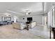 Bright and airy living room with tile floors and ample natural light at 14822 Trinity Fall Way, Bradenton, FL 34212