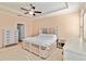 Large main bedroom with carpeted floors and neutral-toned walls at 14822 Trinity Fall Way, Bradenton, FL 34212