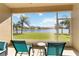 Screened porch overlooking a lake at 14822 Trinity Fall Way, Bradenton, FL 34212