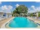 Inviting community pool with ample deck space at 1553 Pleasant Rd # H27, Bradenton, FL 34207