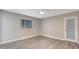 Bedroom with ceiling fan and window at 1608 Honey Ct, Venice, FL 34293