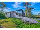 Relaxing screened pool area with lush landscaping at 1608 Honey Ct, Venice, FL 34293