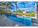 Relaxing screened pool overlooking a canal at 1608 Honey Ct, Venice, FL 34293