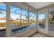 Relaxing screened porch overlooking pool and canal at 1608 Honey Ct, Venice, FL 34293