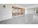 Screened porch with view of the kitchen at 1608 Honey Ct, Venice, FL 34293