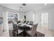 Dining area with sliding glass doors leading to a patio at 1928 Greenlawn Dr, Englewood, FL 34223