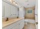 Bathroom with double vanity and shower/tub combo at 1947 W Leewynn Dr, Sarasota, FL 34240