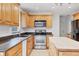 Bright kitchen with stainless steel appliances and an island at 1947 W Leewynn Dr, Sarasota, FL 34240