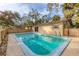 Relaxing rectangular pool with surrounding fence at 1947 W Leewynn Dr, Sarasota, FL 34240