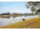 Scenic waterfront view with calm water and houses at 1947 W Leewynn Dr, Sarasota, FL 34240