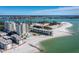 Aerial view of beachfront property showcasing white sand beach at 2050 Benjamin Franklin Dr # A601, Sarasota, FL 34236